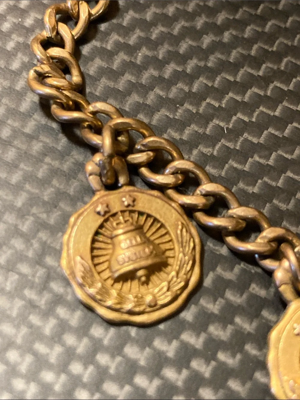 Gold Chain Bracelet marked 1/20 12K with Two 1/10 10K Medallion Charms